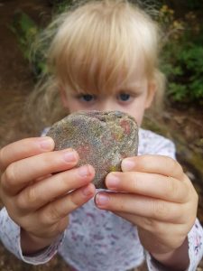 FCSS - child holding painted rock