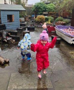 FCSS - children playing outside in puddles