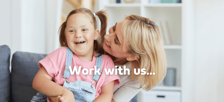 FCSS Job - ASN Groups. Little girl laughing with a childcare practitioner
