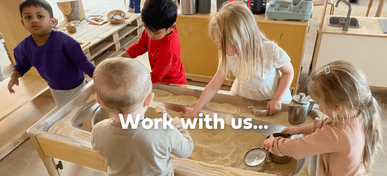 FCSS Children playing in a sand sensory table in Cummings Park Nursery