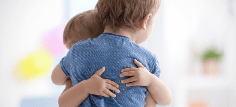 FCSS Valentines blog - a picture or 2 young children hugging. Valentines is not just about hearts