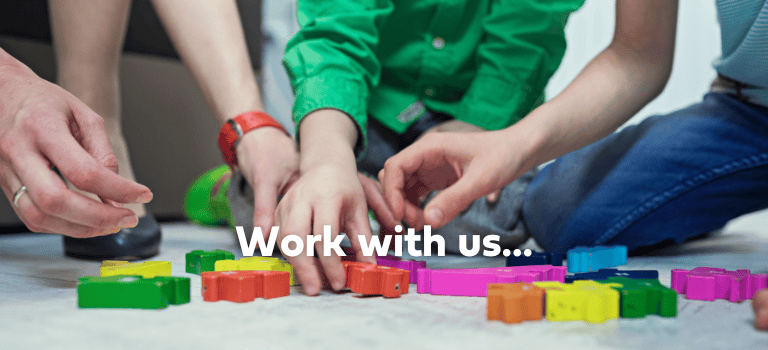 FCSS Jobs. Image of hands moving coloured counters with the text, "work with us"