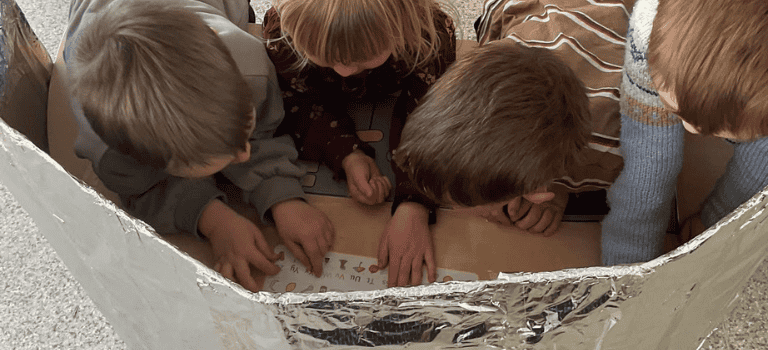 FCSS - children playing in a home made rocket ship