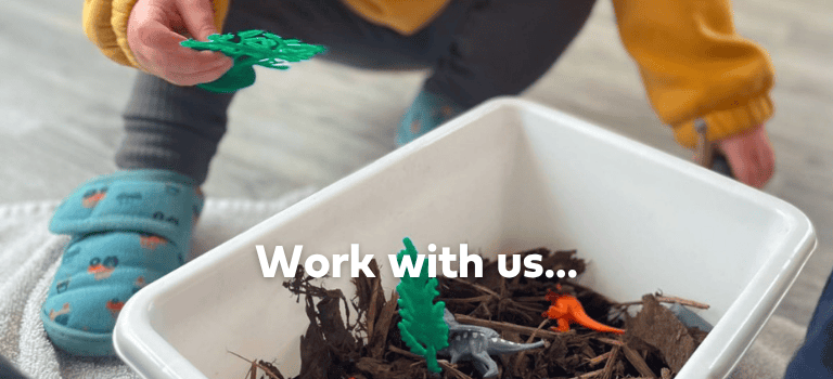 FCSS Job advert. A photo of a child playing with dinosaurs