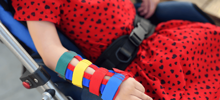 FCSS Case Study. Child in chair with broken arm