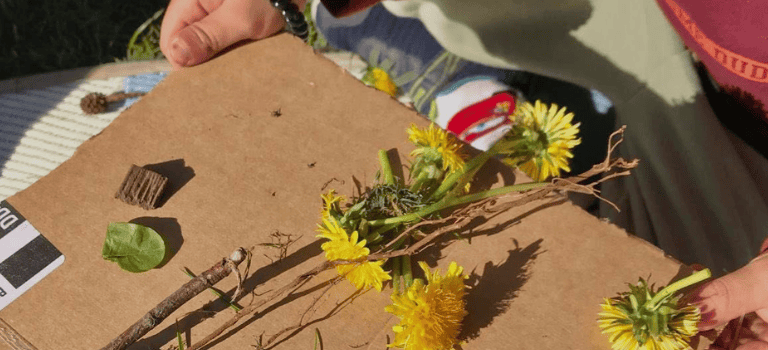 FCSS child playing with flowers